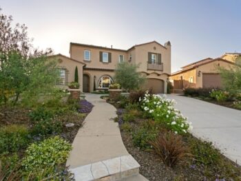 Stylish suburban home with landscaped garden view